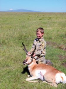 Boy hunting pronghorn antelope