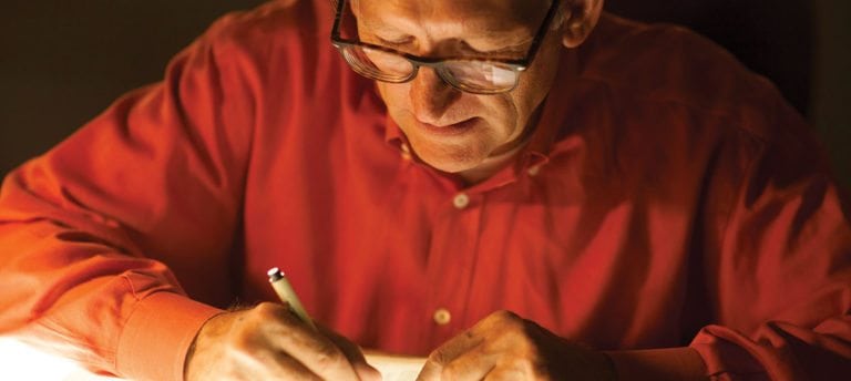 Image of silversmith Clint Orms at work