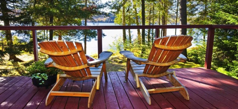 View from porch of log cabin in woods