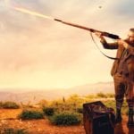 image of man firing shotgun