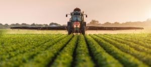 tractor in soybean field