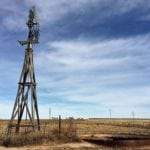 image of windmill on ranch in New Mexico