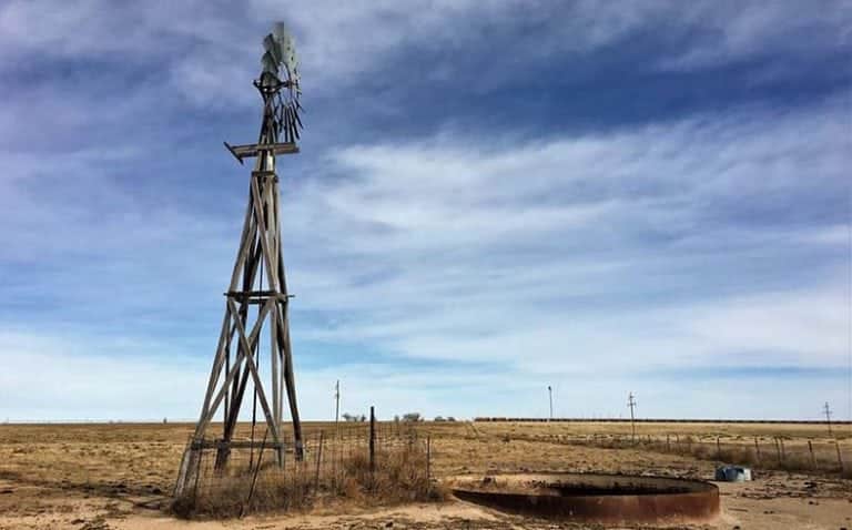 image of windmill on ranch in New Mexico