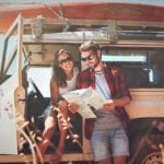 image of adventure travelers with Jeep