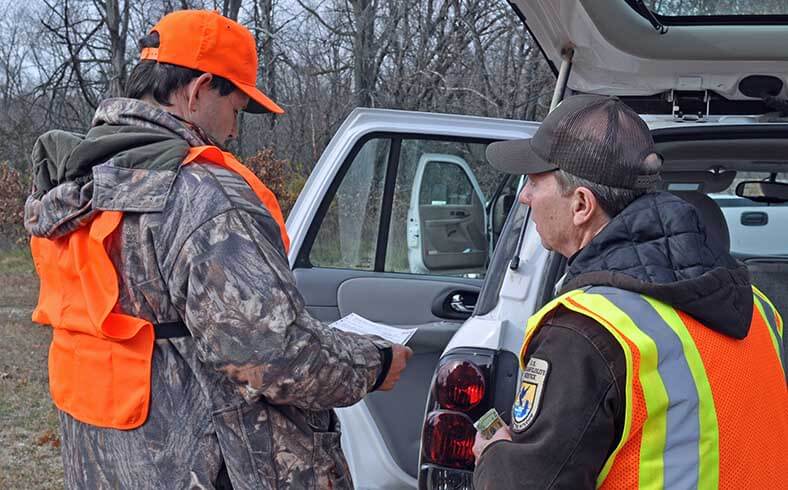 Wildlife refuge manager issues deer permits to hunter