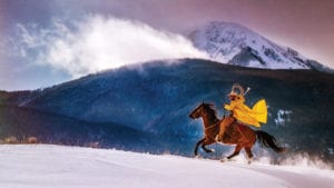 Chris Douglas - cowboy riding horse in snow