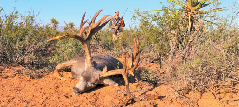 Greg with a deer he shot