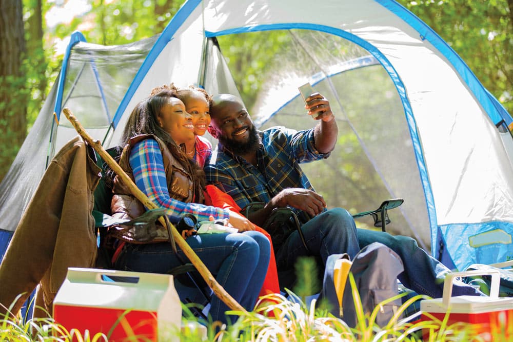 Camping family taking a selfie